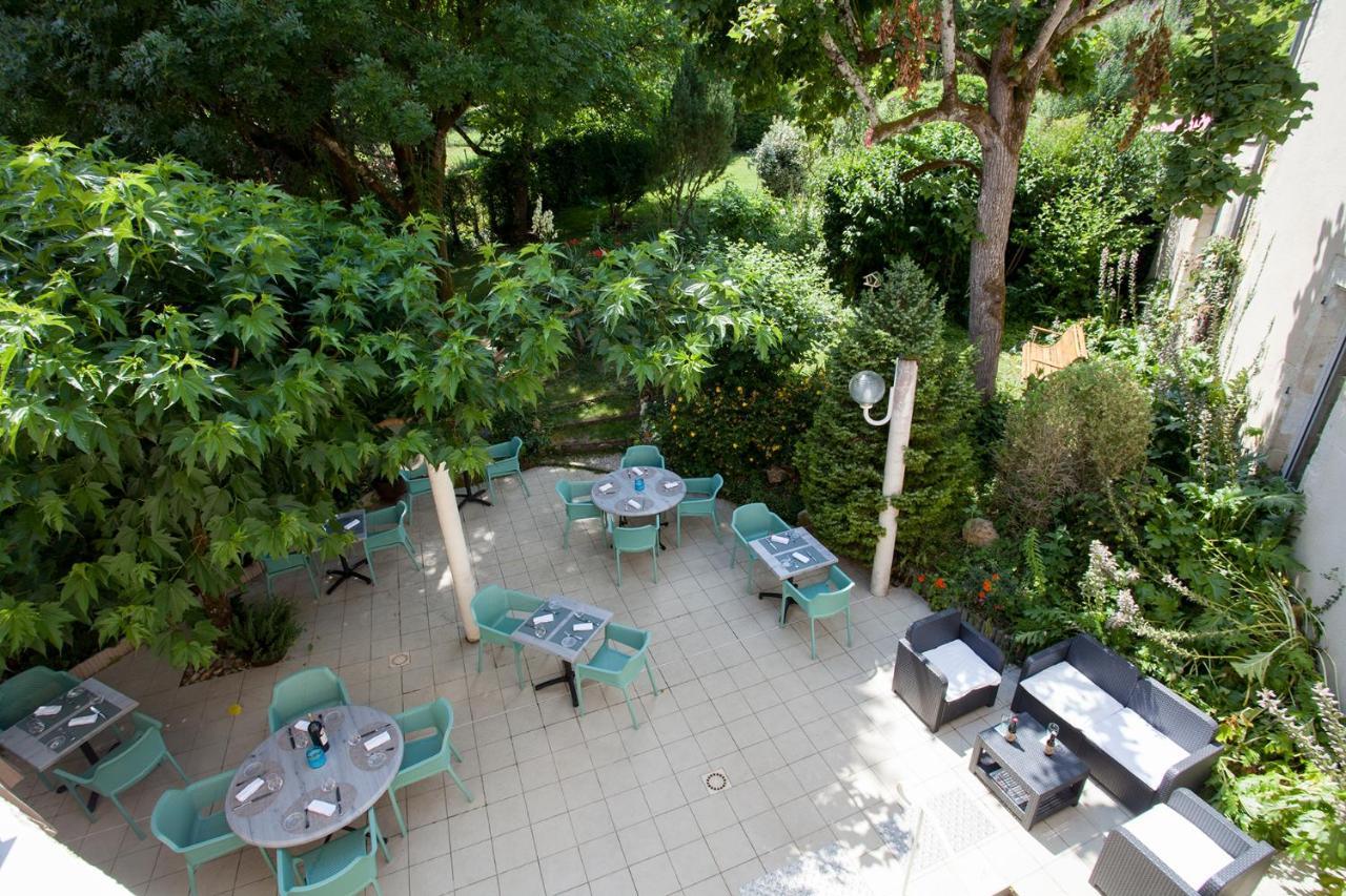 Le Lion D'Or Hotel Manzac-sur-Vern Bagian luar foto