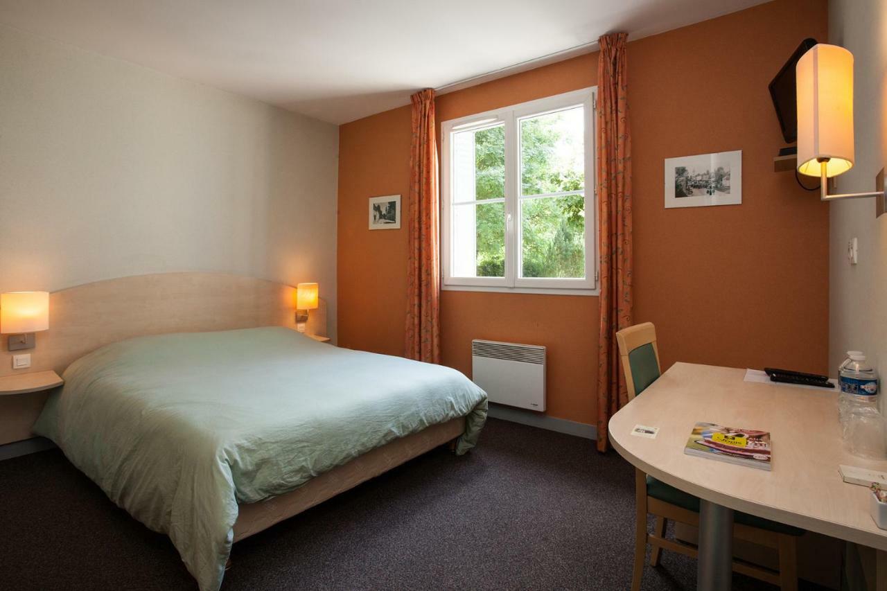 Le Lion D'Or Hotel Manzac-sur-Vern Bagian luar foto